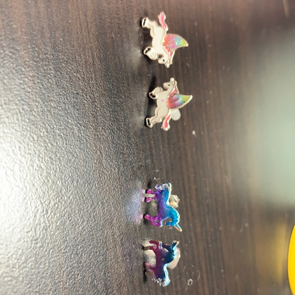 Two unicorn earrings from Claire’s
